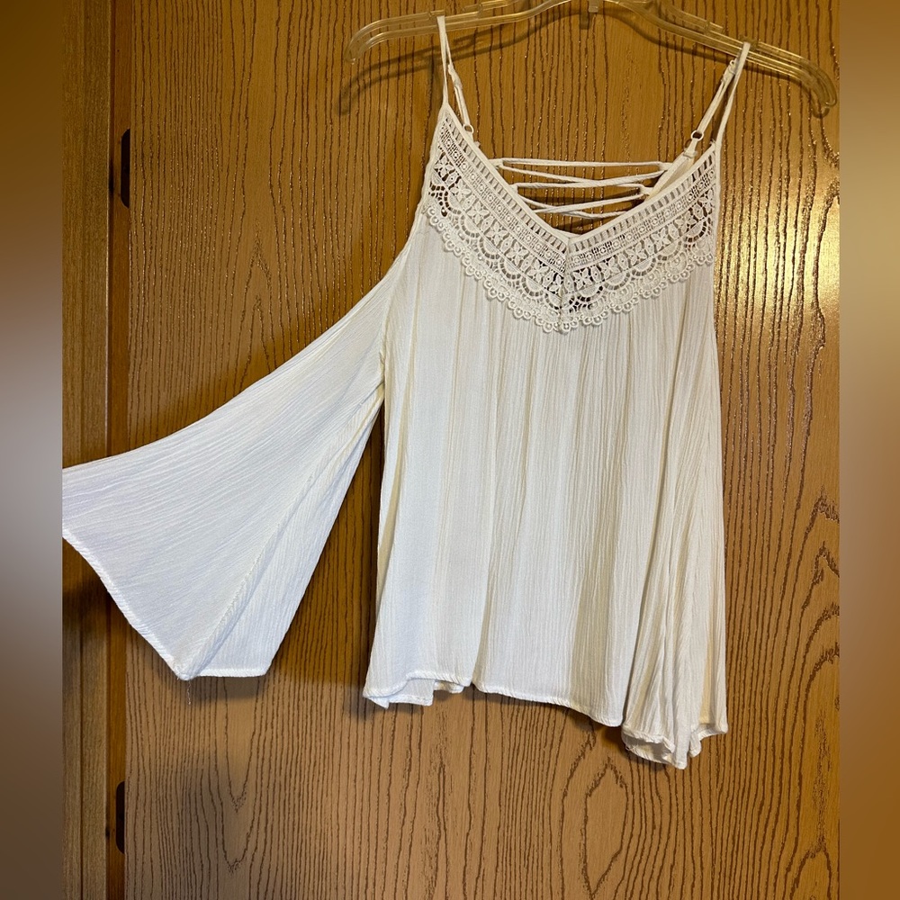 White off the shoulder flowy 3/4 length sleeved top